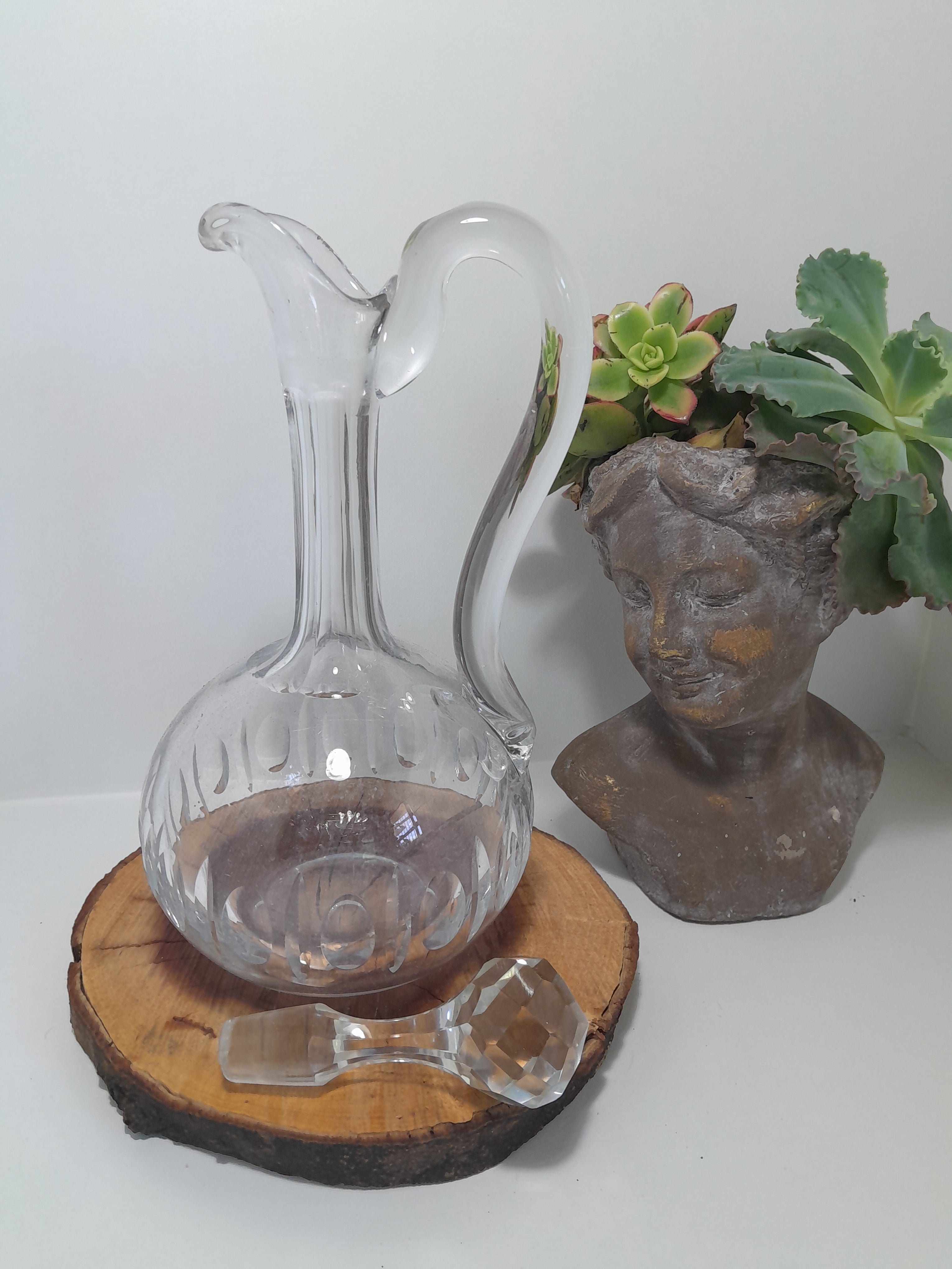 A Handled Crystal Decanter with Multifaceted Stopper