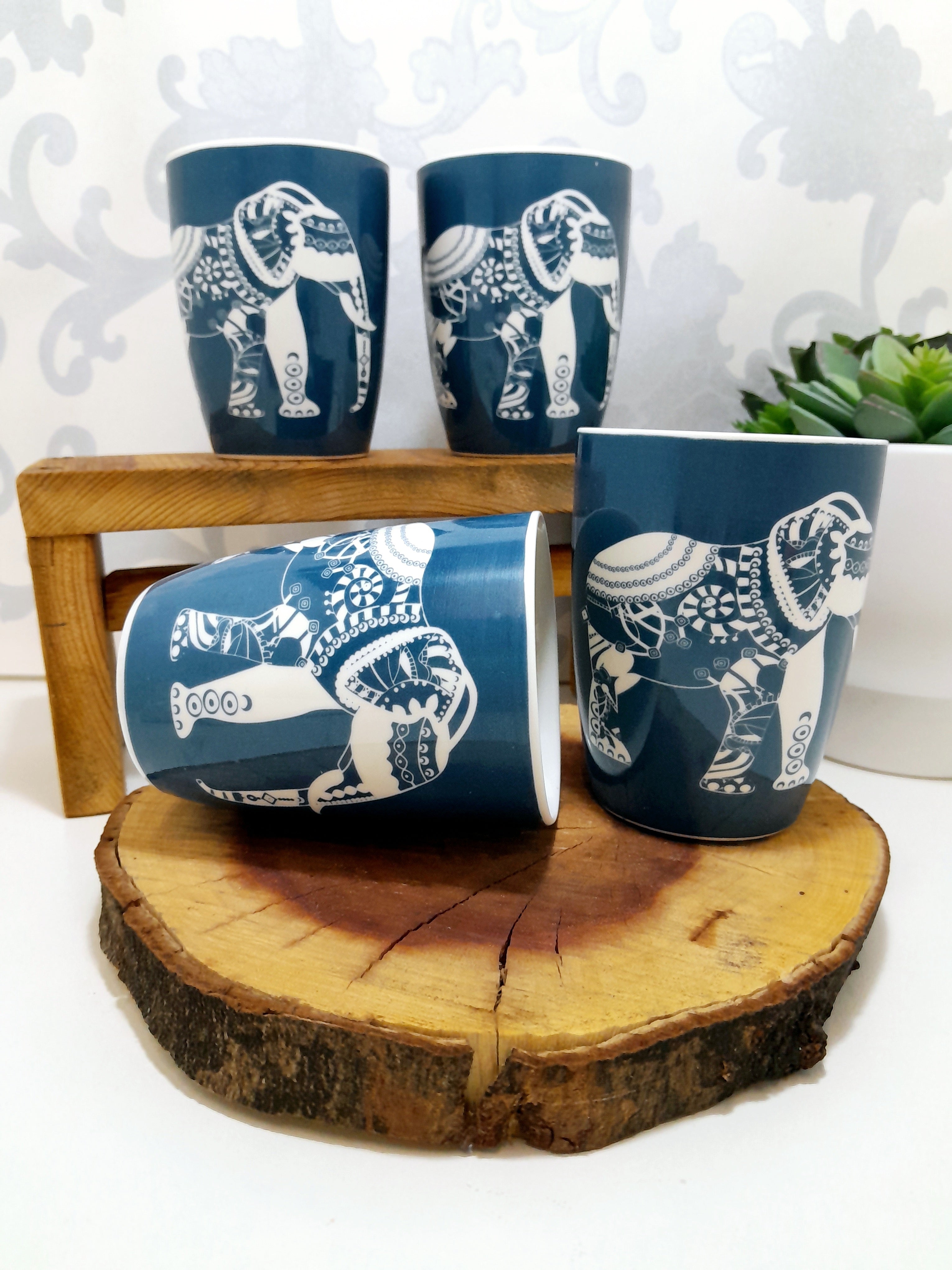Set Of 4 Blue & White Bone China Mugs With Elephant Print