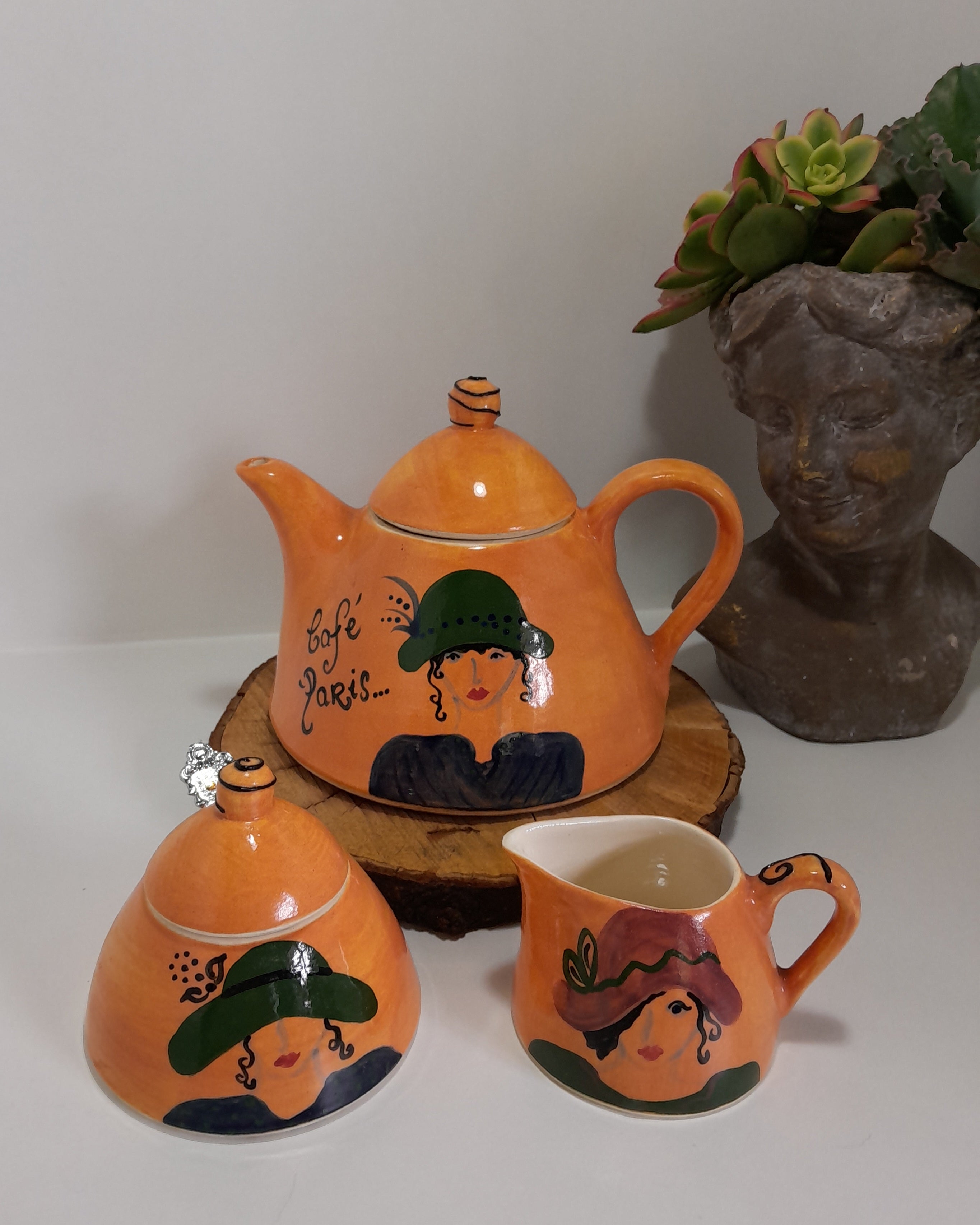 3 Piece Hand-painted Glazed Pottery Tea Set in a Vibrant Orange Colour with Black Trim on Finials and Including a Silver Coloured Sugar Spoon