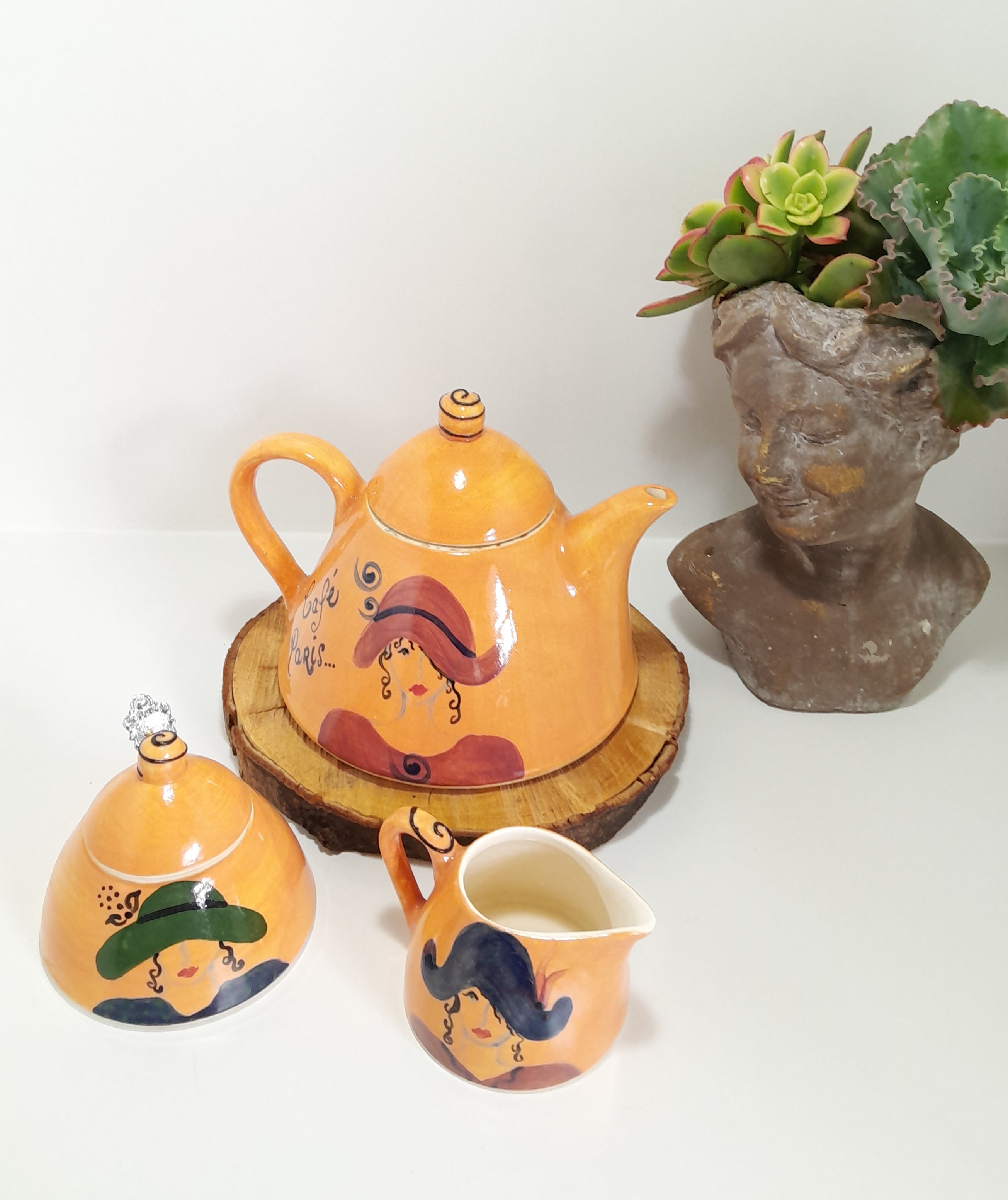 3 Piece Hand-painted Glazed Pottery Tea Set in a Vibrant Orange Colour with Black Trim on Finials and Including a Silver Coloured Sugar Spoon