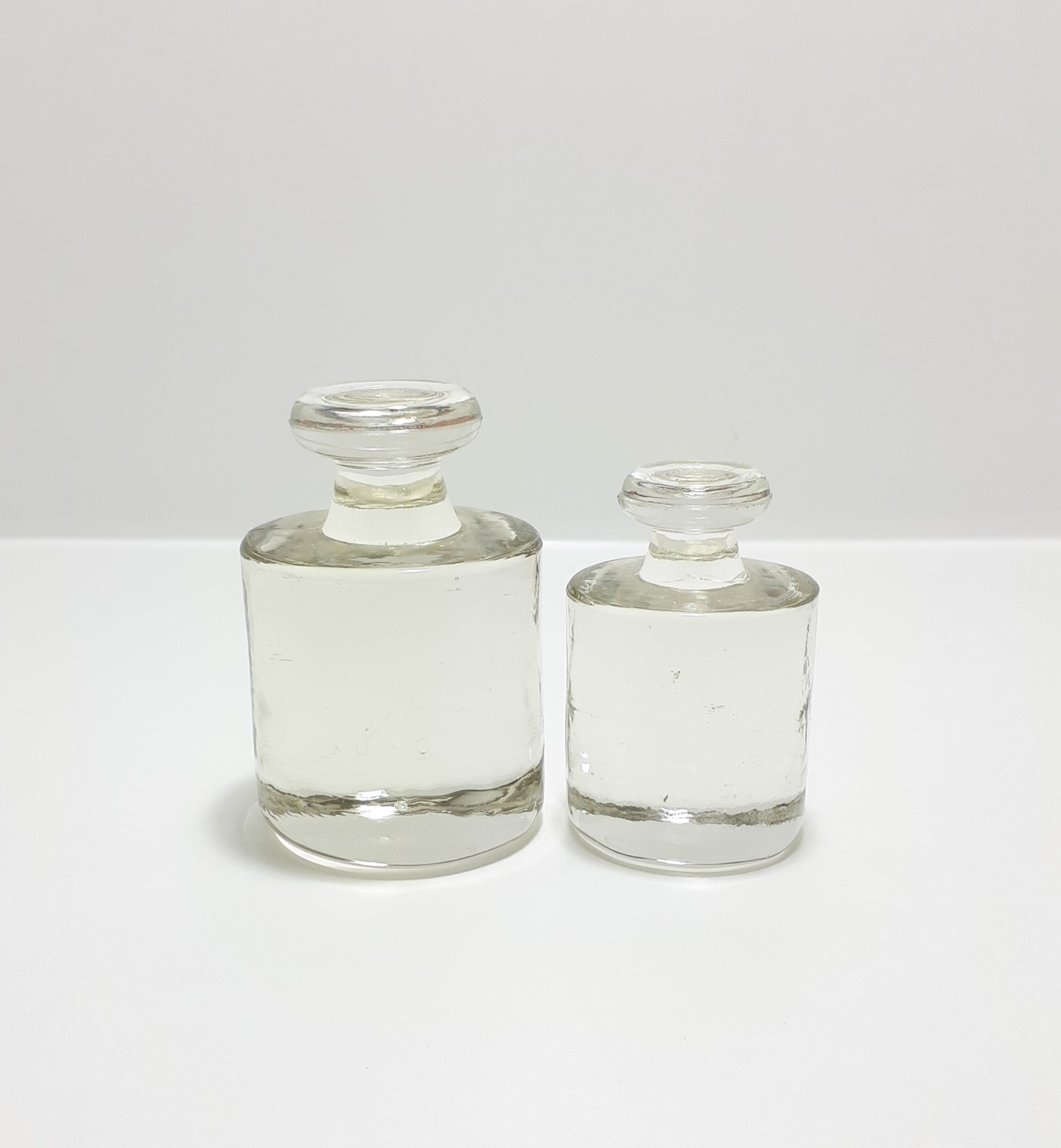Vintage Set Of Two Graduating Glass Paperweights (Scale Design)
