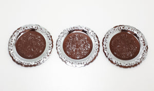 Three Decorative Silver Metal Coasters