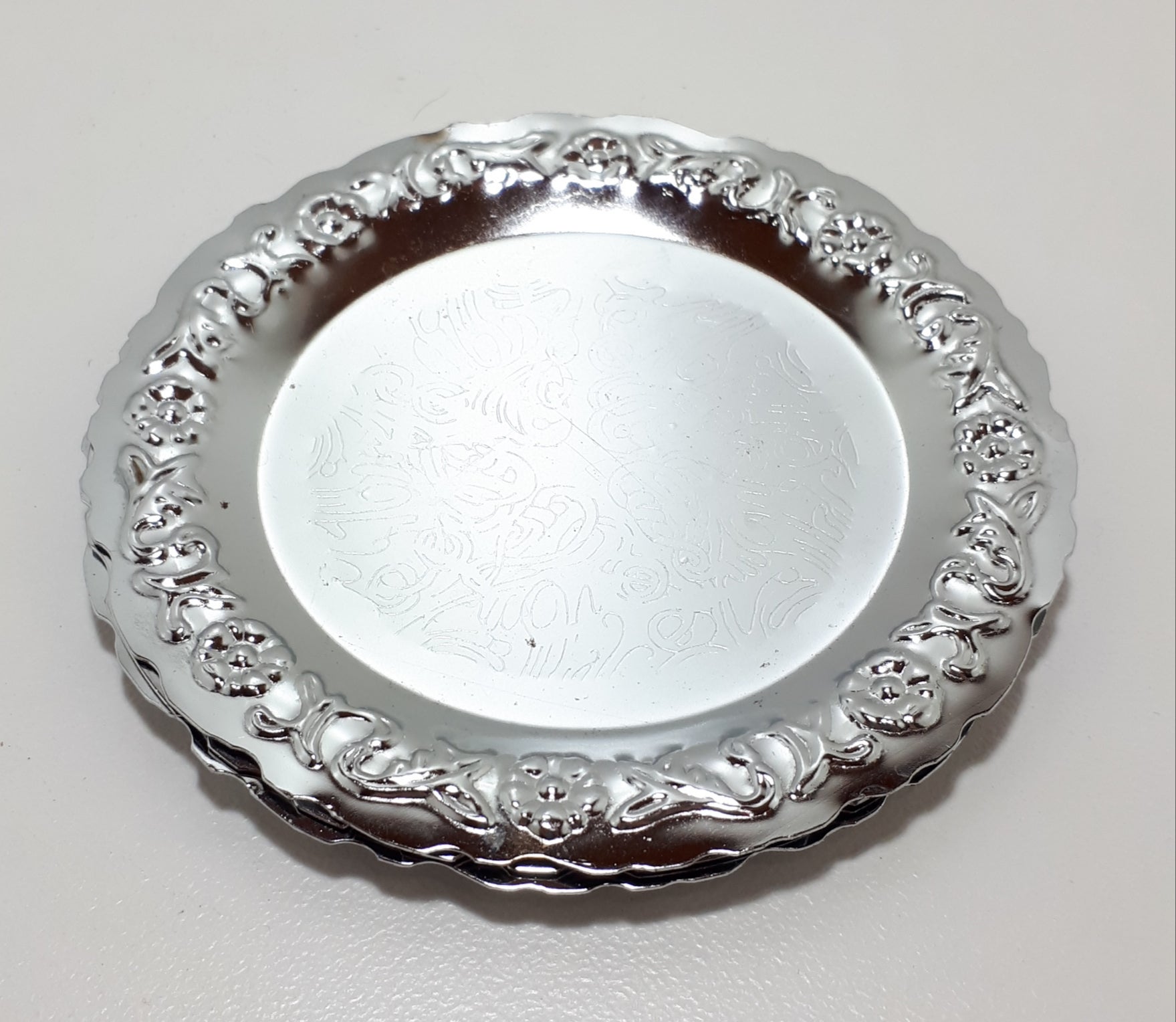 Three Decorative Silver Metal Coasters