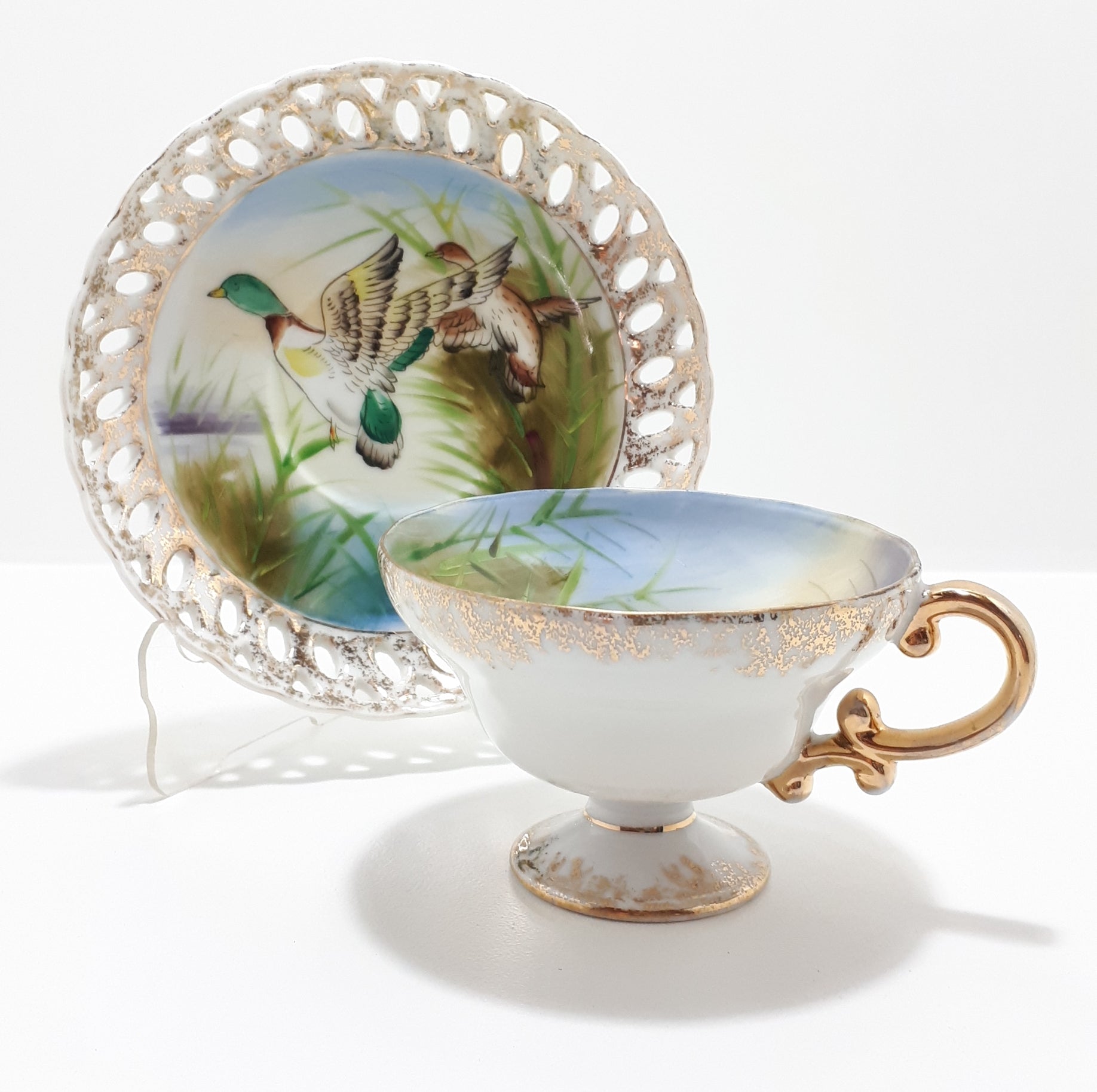 Very Unique Fine Porcelain Tea Duo With Mallard Duck Pattern & Pierced Saucer