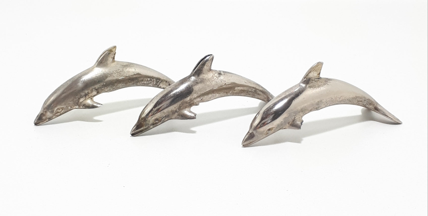 Set Of Three Silver Plated Dolphin Place Name Holders