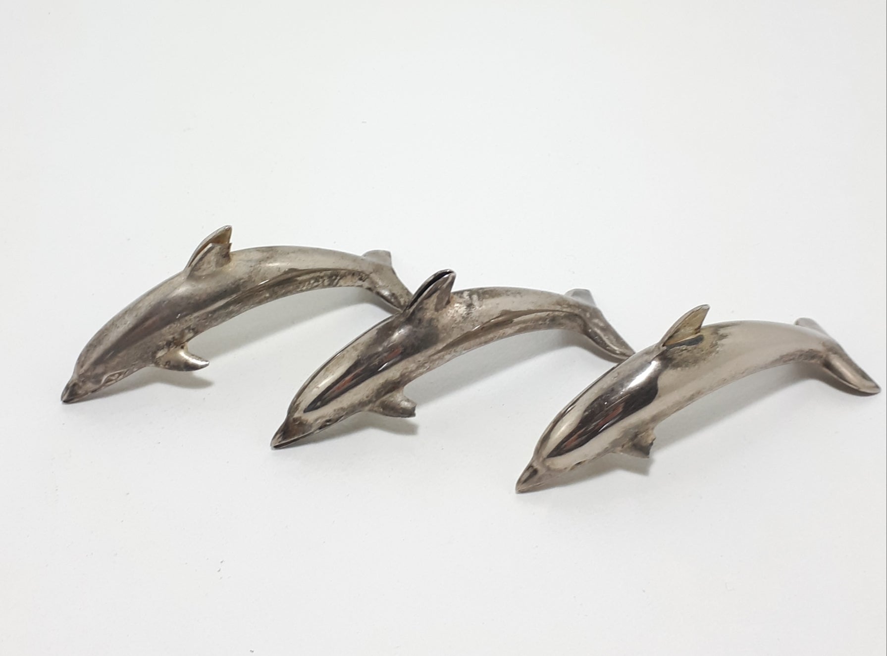 Set Of Three Silver Plated Dolphin Place Name Holders