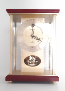 Vintage 1980’s Japanese Rhythm Quartz Mantel Clock – Brass, Maroon Bakelite, Glass & Perspex With Wheel Motion