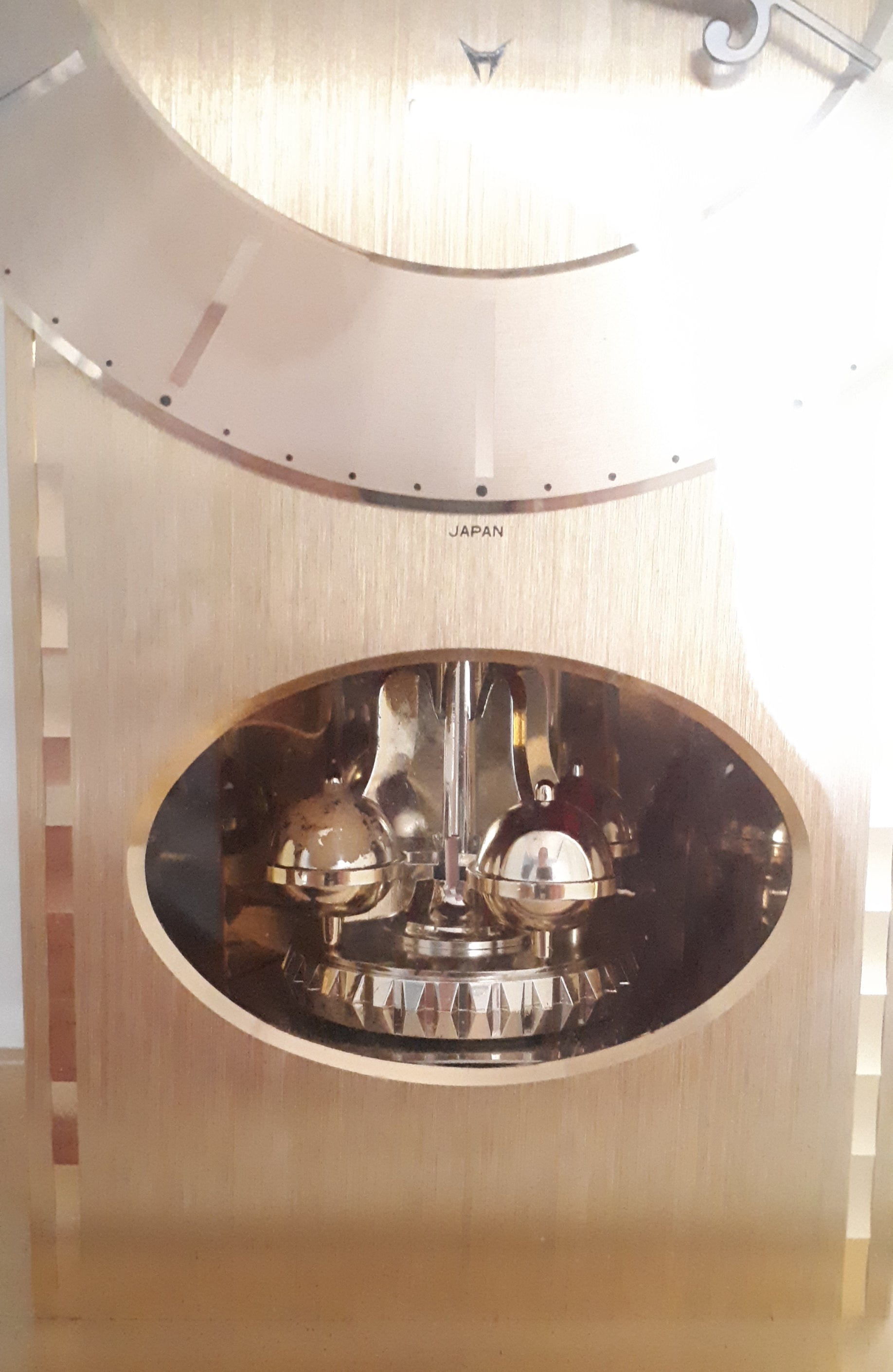 Vintage 1980’s Japanese Rhythm Quartz Mantel Clock – Brass, Maroon Bakelite, Glass & Perspex With Wheel Motion