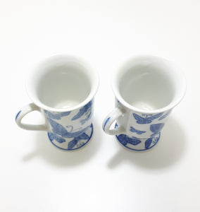 Pair Of Blue & White Footed Coffee Mugs With Butterfly Decoration
