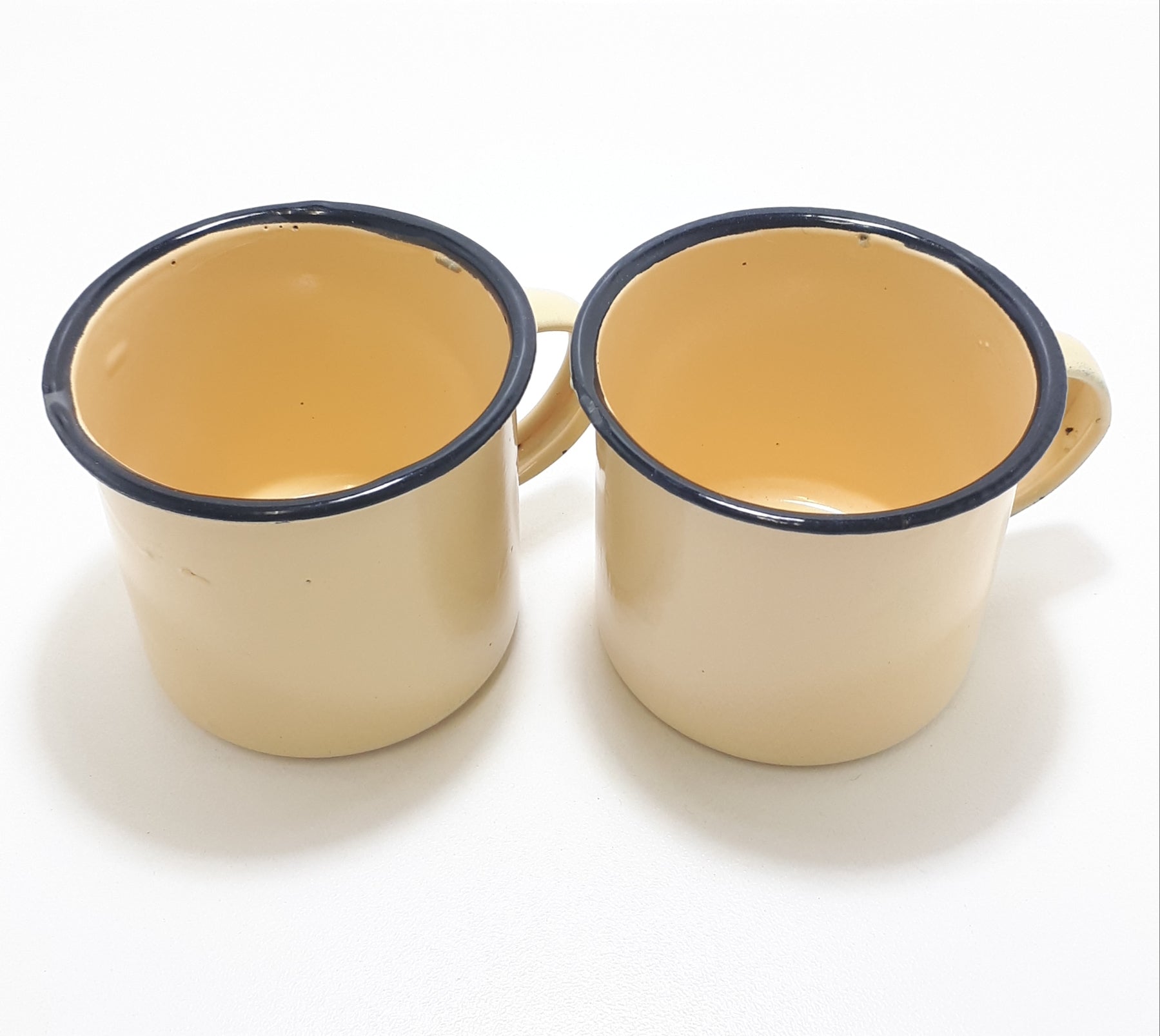 Pair Of Yellow Vintage Enamel Mugs With Broad Black Rim