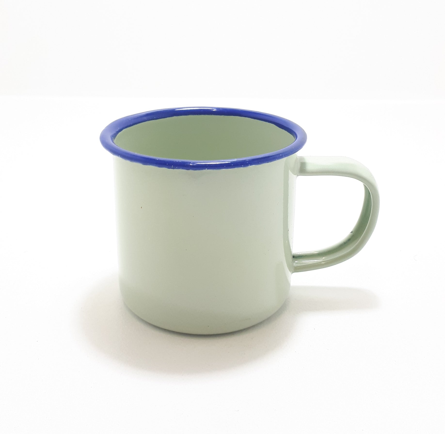 Small Green Vintage Enamel Mug With Broad Blue Rim