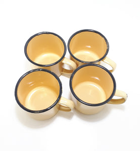 Set Of Four Yellow Vintage Enamel Mugs With Broad Black Rim